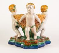 MINTON STYLE MAJOLICA POTTERY TABLE CENTREPIECE BOWL, modelled as three cherubs supporting an
