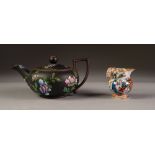 NINETEENTH CENTURY WEDGWOOD BLACK BASALT SMALL TEAPOT, with angular scroll handle, floral painted in