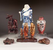 MODERN ORIENTAL CARVED HARDSTONE GROUP, modelled as three immortals, each with attribute, on a