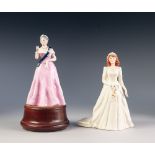 TWO BOXED ROYAL DOULTON LIMITED EDITION ROYAL COMMEMORATIVE CHINA FIGURES, 'QUEEN ELIZABETH THE