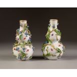 PAIR OF LATE NINETEENTH/ EARLY TWENTIETH CENTURY MEISSEN PORCELAIN SMALL VASES, each of double gourd