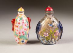 A GOOD CHINESE CLEAR AND BLUE OVERLAY CAMEO GLASS SNUFF BOTTLE, enamelled on each side with birds
