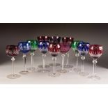 SET OF SIX CUT HOCK GLASSES, WITH FLASH CUT HARLEQUIN BOWLS, together with SIX SIMILAR GLASSES, (