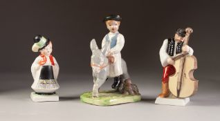 JXSEPY HAND PAINTED EARTHENWARE POTTERY GROUP OF A BOY RIDING A DONKEY, together with a HEREND