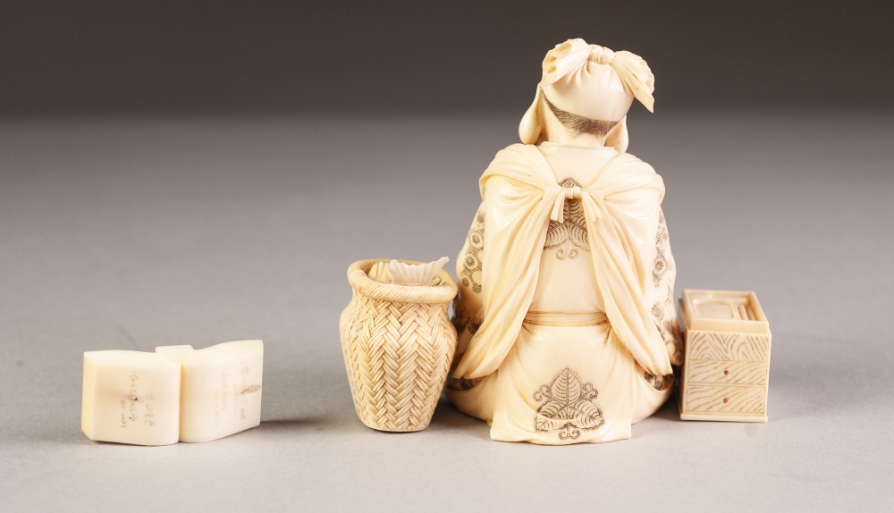 JAPANESE MEIJI PERIOD CARVED SECTIONAL IVORY OKIMONO OF A STREET VENDOR, modelled seated with a - Image 3 of 6