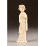 JAPANESE MEIJI PERIOD CARVED ONE PIECE IVORY FIGURE OF A GEISHA, 6" (15.2cm) high