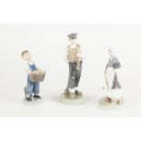 THREE MODERN ROYAL COPENHAGEN PORCELAIN FIGURES, model numbers 4532, 620, and 528, 8 3/4" (22cm)