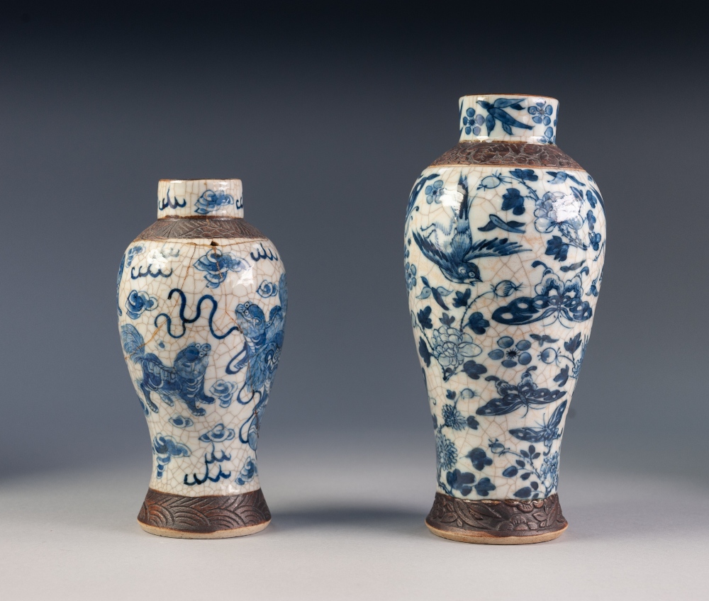 CHINESE CRACKLE WARE SLENDER OVULAR BLUE AND WHITE VASE, painted autour with butterflies, birds