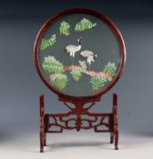 CHINESE TABLE SCREEN, THE REMOVABLE CIRCULAR SCREEN CONSISTING OF AN EMBROIDERED SILK PICTURE OF TWO