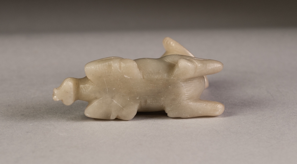 CHINESE CARVED MUTTON FAT JADE COLOURED HARDSTONE MODEL OF A RAM, modelled kneeling, 2 ½" (6.3cm) - Image 2 of 3