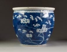 NINETEENTH CENTURY CHINESE BLUE AND WHITE PORCELAIN JARDINIÈRE, of typical form, painted with prunus