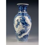 CHINESE PORCELAIN BLUE AND WHITE OVULAR VASE, with waisted neck, embossed with white dragons on a