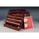 CHINESE BONE AND BAMBOO MAH-JONG SET, housed in a four drawer redwood box with sliding front panel