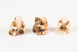 THREE JAPANESE MEIJI PERIOD CARVED AND STAINED IVORY NETSUKE, all signed, (in damaged condition)