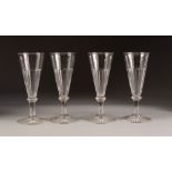 A SET OF FOUR TWENTIETH CENTURY CHAMPAGNE FLUTES