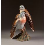 BESWICK POTTERY GROUP OF TWO BIRDS, modelled perched on a branch, one with wings open, 7 ½" (19cm)