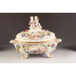 A GOOD LATE NINETEENTH CENTURY MEISSEN PORCELAIN OVAL TUREEN AND COVER, the base encrusted with