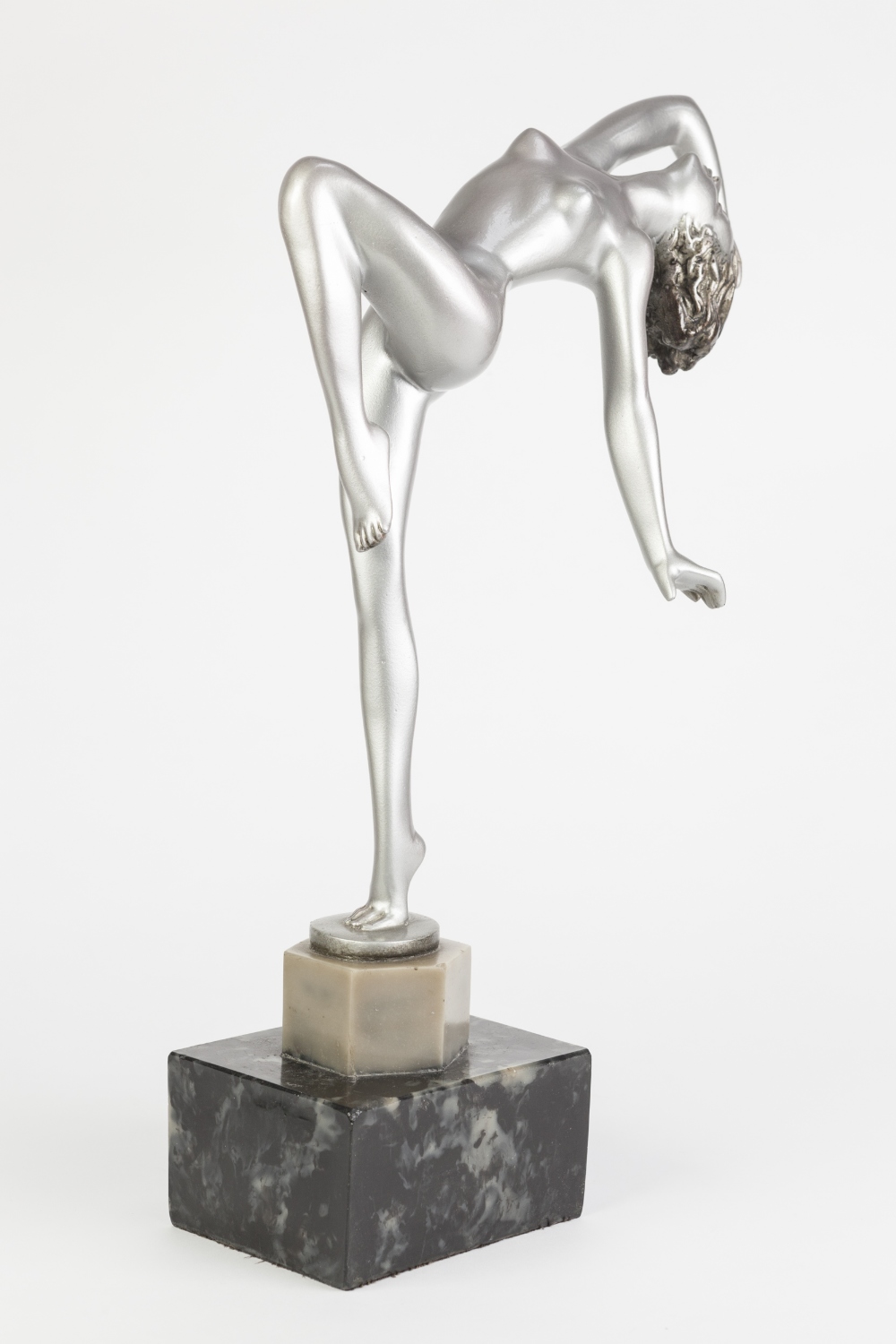 REPRODUCTION ART DECO NAKED FEMALE FIGURE IN SILVERED COMPOSITION, modelled in stylised pose, on