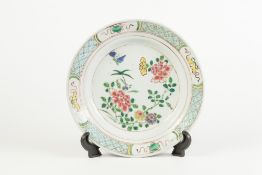 19th CENTURY CHINESE PORCELAIN SHALLOW DISH, polychromed in overglaze enamels with peony and other