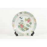 19th CENTURY CHINESE PORCELAIN SHALLOW DISH, polychromed in overglaze enamels with peony and other