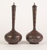 PAIR OF MIDDLE EASTERN GOLD INLAID WHITE METAL VASES AND COVERS, each of globe and shaft form with