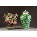 CARDINAL, PHILIPPINES, PORCELAIN GINGER JAR AND COVER, of waisted form, painted with dense green,