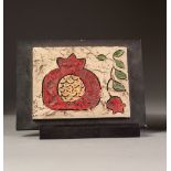 G.R.A.S. MOULDED STUDIO POTTERY OBLONG PLAQUE, decorated with a pomegranate 4 ¾" x 5 ¾" (12cm x 14.