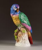 MODERN DRESDEN PORCELAIN MODEL OF A PARROT, painted in colours and modelled perched on a stump,