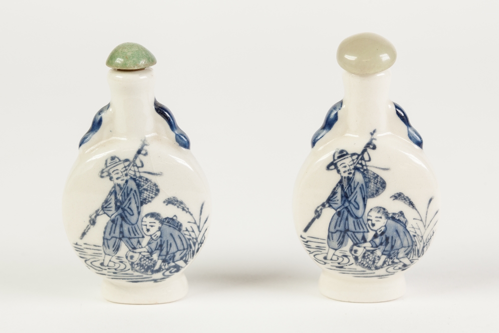 TWO IDENTICAL MODERN CHINESE POTTERY SNUFF BOTTLES, decorated with figures in blue - Image 2 of 2
