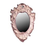 CONTINENTAL MOULDED POTTERY FRAMED WALL MIRROR IN THE ROCOCO STYLE, the bevel edged plat of shaped