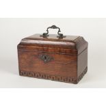 GEORGE III OAK TEA CADDY with divided interior, having a cast brass bail carrying handle and