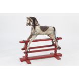 LATE NINETEENTH/ EARLY TWENTIETH CENTURY GREY PAINTED AND CARVED WOOD SMALL PLATFORM ROCKING