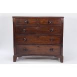 GEORGE III MAHOGANY CHEST of two short and three graduated long drawers with later wooden knob