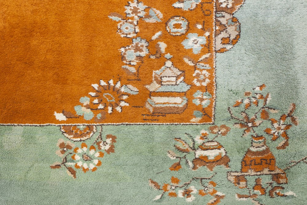 INDIAN CARPET, with chinoiserie scattered decoration of vases of flowers and floral sprays on a - Image 2 of 2