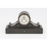 LATE VICTORIAN CARVED BLACK SLATE MANTLE CLOCK, the 4 ¾" two part Roman dial with visible brocot