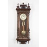EARLY TWENTIETH CENTURY WALNUT CASED VIENNA WALL CLOCK, of typical form with subsidiary seconds dial