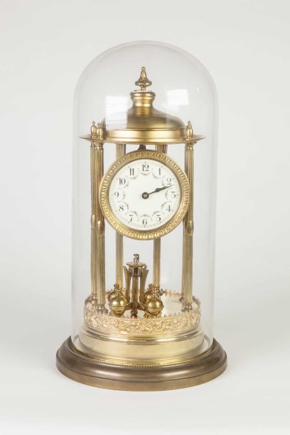 PROBABLY GERMAN LATE NINETEENTH CENTURY METAL TORZION MANTEL CLOCK, the movement with circular