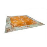 INDIAN CARPET, with chinoiserie scattered decoration of vases of flowers and floral sprays on a