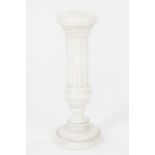 WHITE VEINED MARBLE PEDESTAL, of part fluted form with circular top and base, 26 ¼" (66.7cm) high