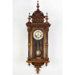 EARLY TWENTIETH CENTURY H.A.C, GERMAN WALNUT STAINED AND CARVED BEECH CASED VIENNA STYLE WALL CLOCK,