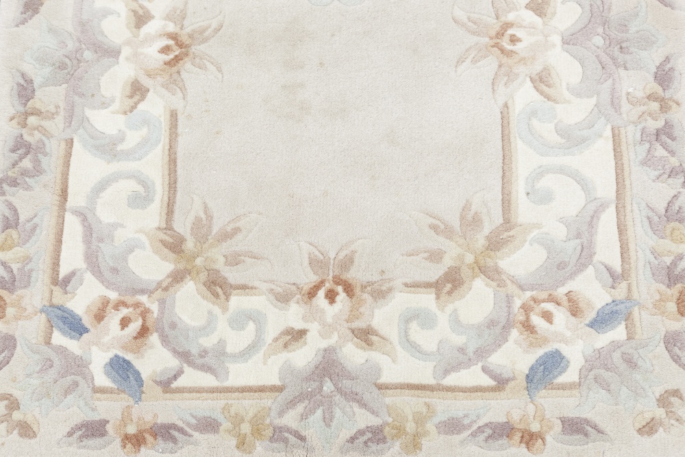 WASHED CHINESE EMBOSSED RUG, with Aubusson design on mushroom field with off white border, 5' x 2'6" - Image 2 of 3