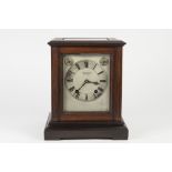 AN EDWARDIAN PLAIN MAHOGANY CASED MANTEL CLOCK, the Winterhalder and Hoffmeirer German movement