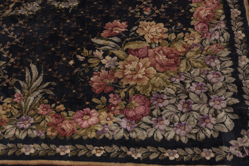 PROBABLY FRENCH SEMI ANTIQUE HAND WOVEN ALL-WOOL CARPET, with large oval floral wreath and ribbon on - Image 2 of 2