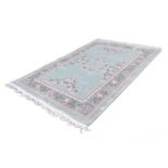 GOOD HEAVY QUALITY WASHED CHINESE CARPET, with embossed and pastel coloured 'Mandarin' floral