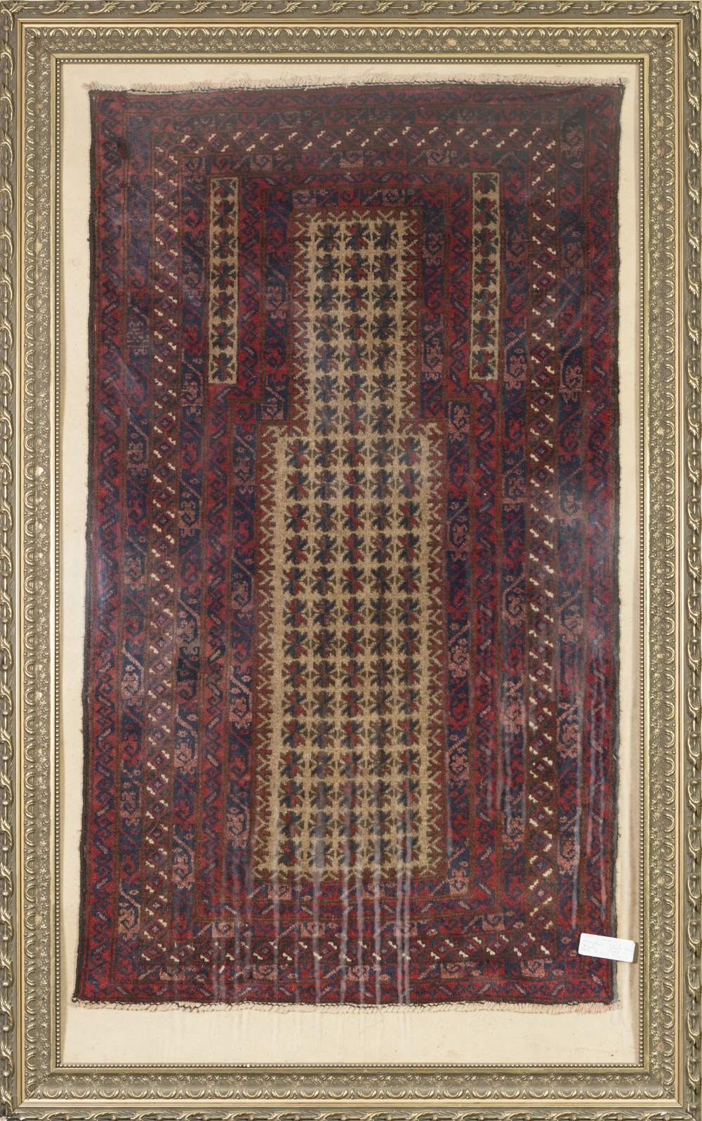 ANTIQUE EASTERN PRAYER RUG, with off white and diaper striped centre panel and rectangular mihrab