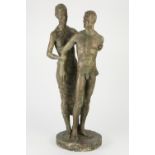 UNATTRIBUTED, (TWENTIETH CENTURY) PATINATED PLASTER GROUP Standing semi naked woman holding or