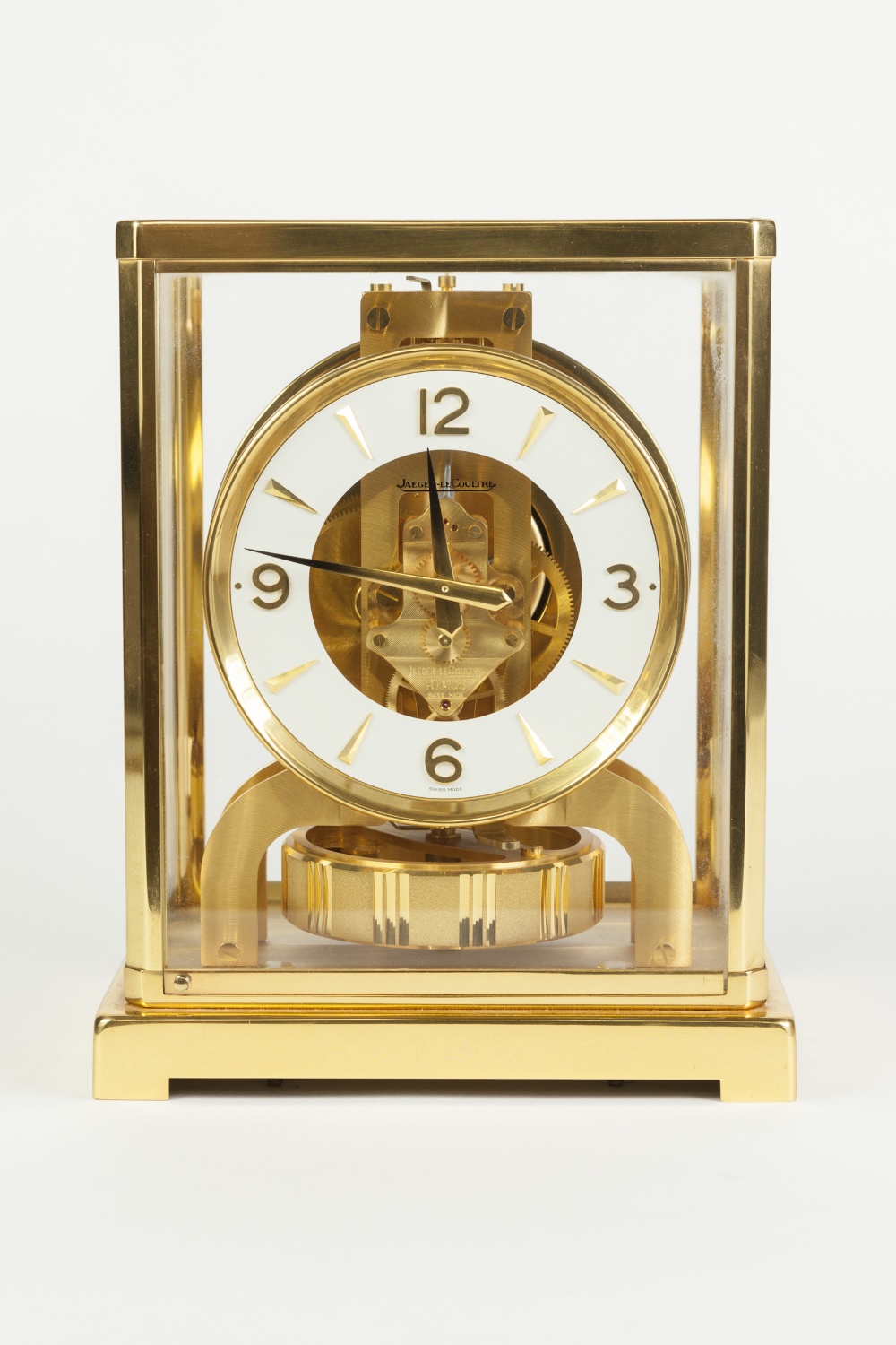 JAEGAR-LE-COULTRE GILT BRASS CASED ATMOS MANTLE CLOCK, the white chapter ring with raised Arabic and