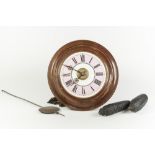 EARLY TWENTIETH CENTURY POSTMAN'S WALL MOUNTED ALARM CLOCK, of typical form with 6 ¾" white and pink