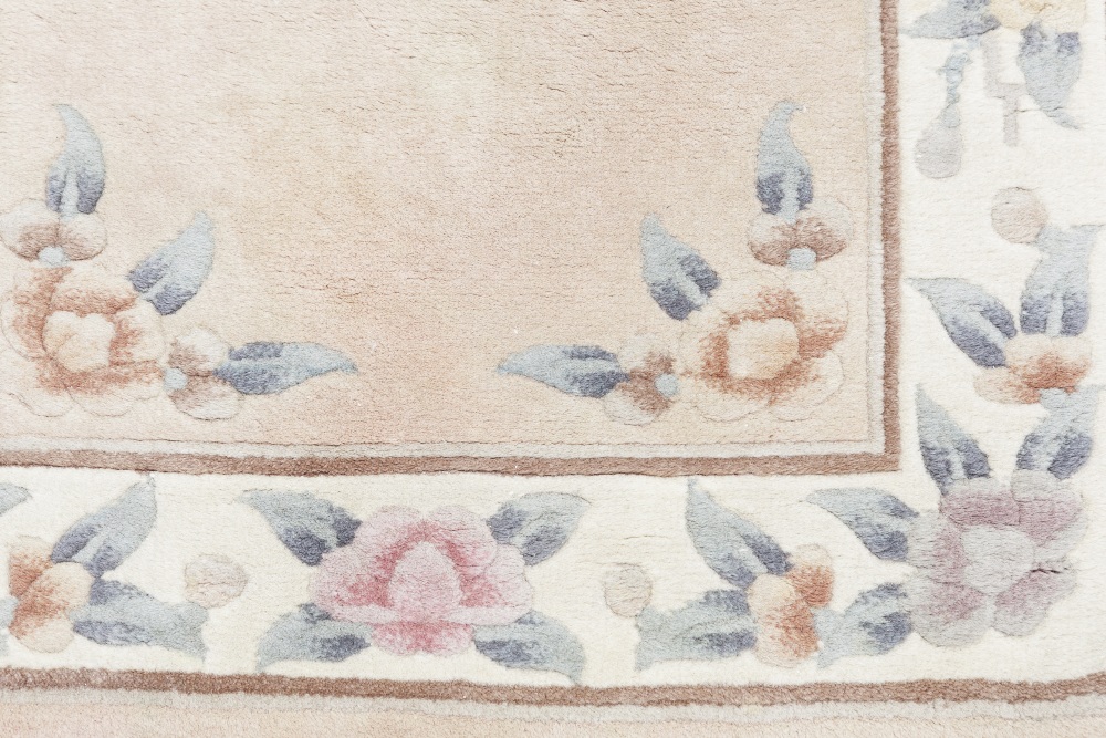 WASHED CHINESE 'KAYARN' SUPER QUALITY, ALL WOOL, EMBOSSED RUG, with three floral motifs on a pink - Image 3 of 4