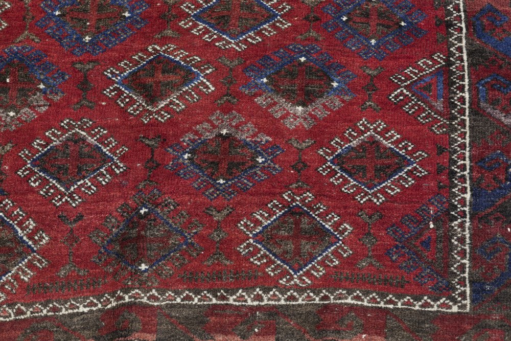 TURKOMAN TRIBAL RUG, with an all-over pattern of diamond shaped guls on a crimson field, crimson - Image 2 of 2